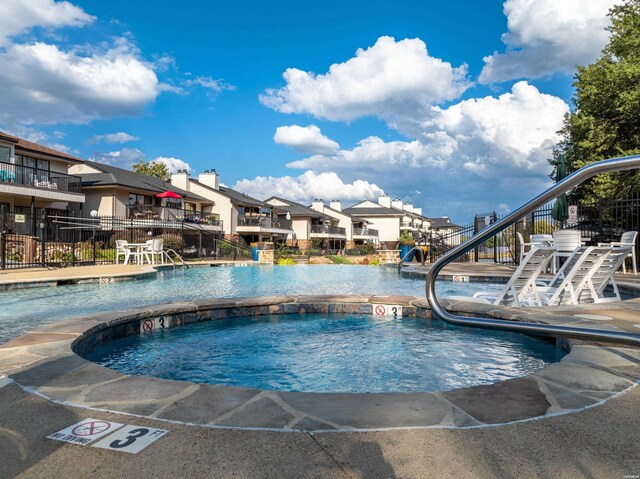 5371 Central Ave Unit 6J, Hot Springs, AR 71913 - community pool with stairs, a residential view, fence, and a patio