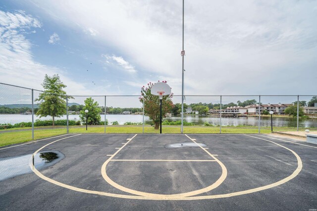 5371 Central Ave Unit 6J, Hot Springs, AR 71913 - view of sport court with fence, a water view, plenty of natural light, and community basketball court