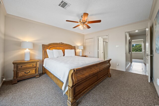 5371 Central Ave Unit 6J, Hot Springs, AR 71913 - bedroom featuring ornamental molding, carpet, ceiling fan, baseboards, and a textured ceiling