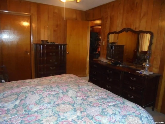 738 Pine St, Amity, AR 71921 - bedroom featuring wood walls