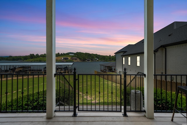 125 Eagle View Pt, Hot Springs, AR 71913 - yard at dusk with a water view, a lawn, and a balcony