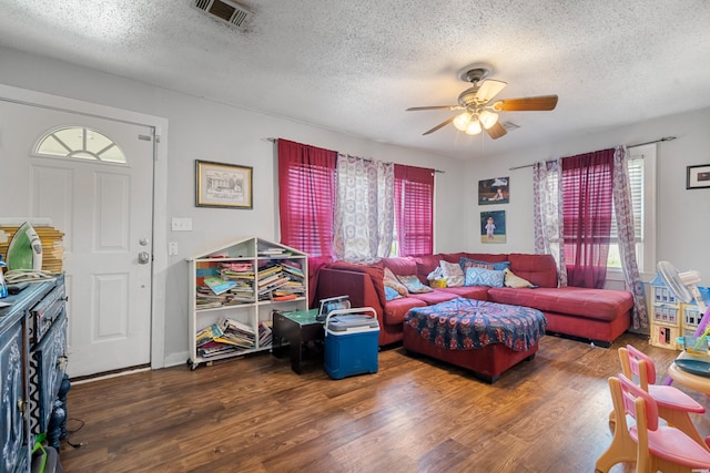 417 Woodlawn Ave, Hot Springs, AR 71913 - living room with a textured ceiling, ceiling fan, and wood finished floors