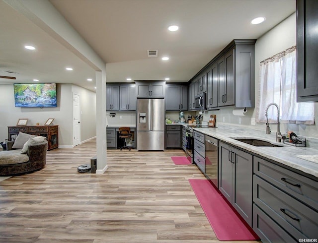 111 Westgate Ter, Hot Springs, AR 71913 - kitchen with a sink, stainless steel appliances, light wood finished floors, and visible vents