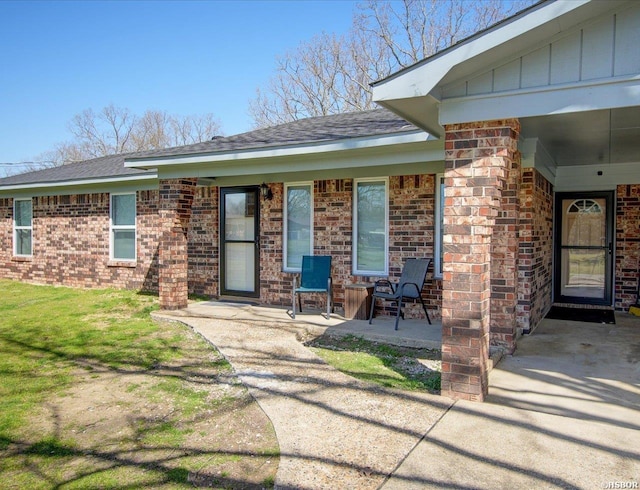 111 Westgate Ter, Hot Springs, AR 71913 - doorway to property with brick siding and roof with shingles