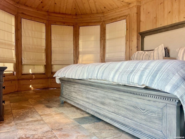 280 Overview Cir, Hot Springs, AR 71913 - bedroom with wood walls and stone finish floors