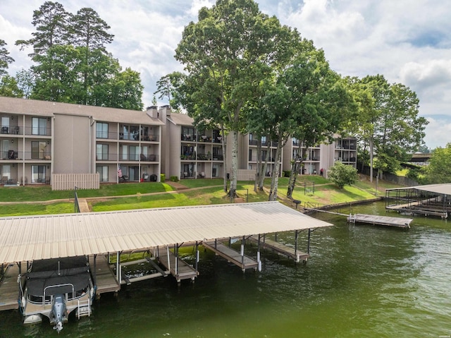 view of dock with a water view and boat lift