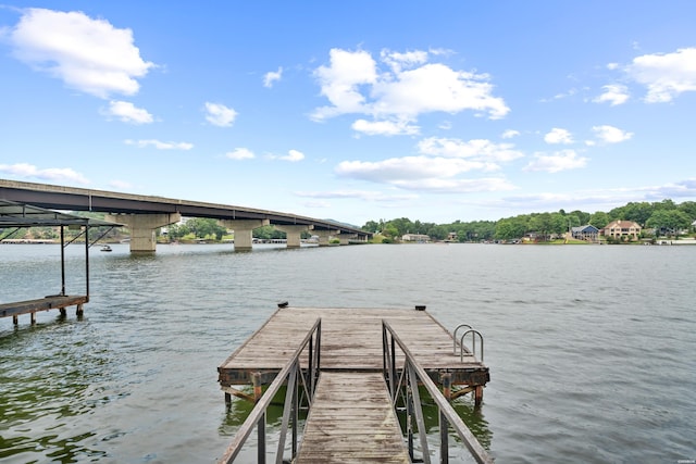 view of dock with a water view