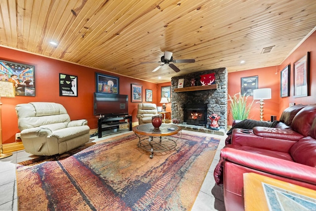 living room with a stone fireplace, wooden ceiling, recessed lighting, a ceiling fan, and baseboards