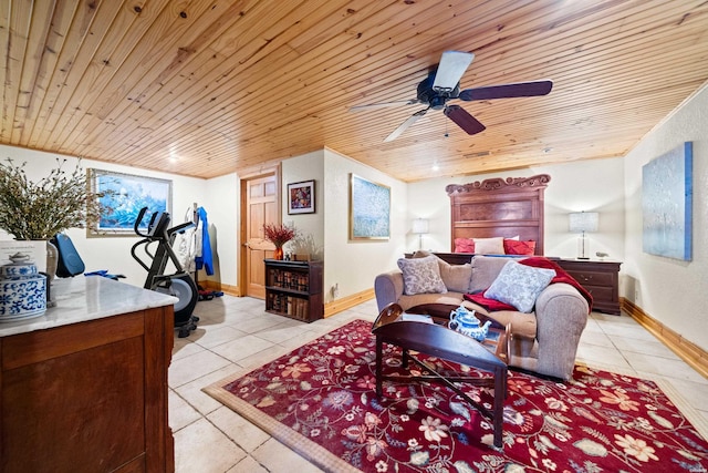 bedroom featuring wooden ceiling, light tile patterned floors, ceiling fan, and baseboards