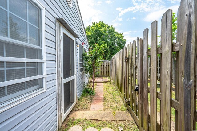 view of yard featuring a gate and fence