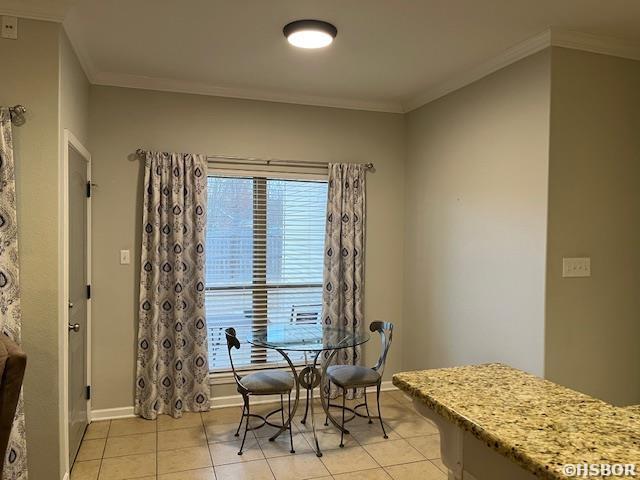107 Legacy Ln, Hot Springs, AR 71901 - dining area featuring crown molding, baseboards, and light tile patterned floors