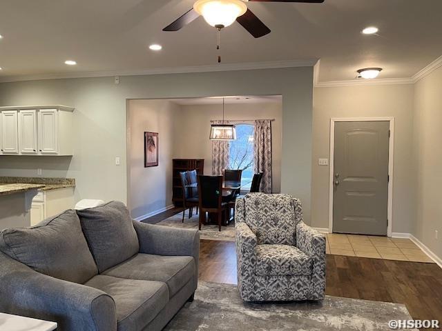 107 Legacy Ln, Hot Springs, AR 71901 - living area with baseboards, ornamental molding, wood finished floors, and recessed lighting