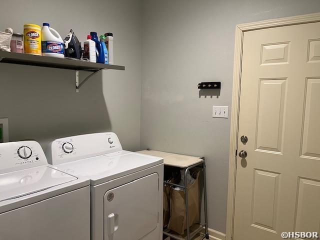 107 Legacy Ln, Hot Springs, AR 71901 - washroom with laundry area and washer and clothes dryer