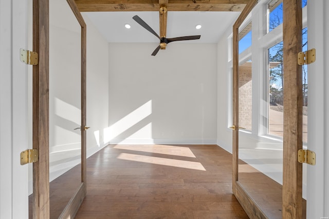 interior space featuring recessed lighting, wood finished floors, a ceiling fan, baseboards, and french doors