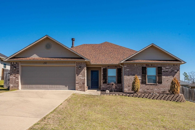 ranch-style house with driveway, a front lawn, an attached garage, a shingled roof, and brick siding