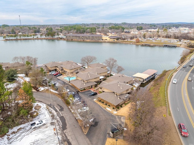 bird's eye view featuring a water view and a residential view