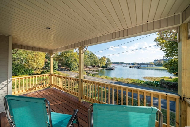 deck featuring a water view