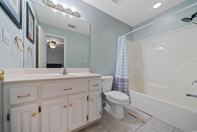 bathroom with visible vents, toilet, shower / bath combo with shower curtain, a textured ceiling, and tile patterned floors