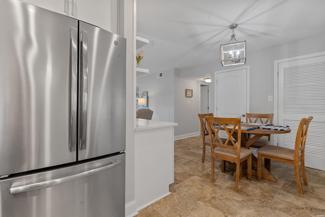 200 Hamilton Oaks Dr Unit N-1, Hot Springs, AR 71913 - dining space with a chandelier and baseboards