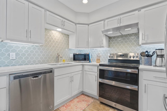 200 Hamilton Oaks Dr Unit N-1, Hot Springs, AR 71913 - kitchen with stainless steel appliances, under cabinet range hood, light countertops, a sink, and white cabinets