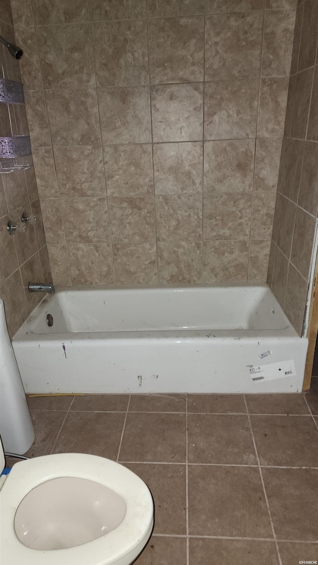 357 W Walnut St, Prescott, AR 71857 - bathroom with tile patterned flooring, toilet, and bathtub / shower combination
