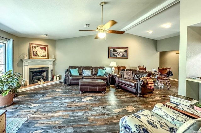 10 Steeplechase Ct, Hot Springs, AR 71901 - living area with wood finished floors, ceiling fan, a fireplace with raised hearth, and baseboards