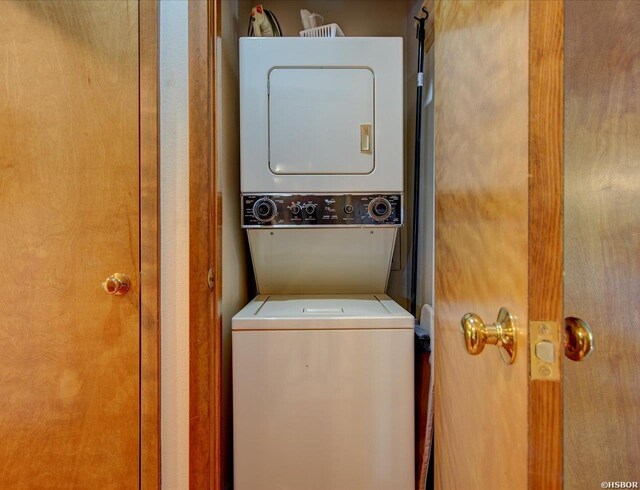 8 Redbird Ln Unit D, Mount Ida, AR 71957 - laundry room with stacked washing machine and dryer