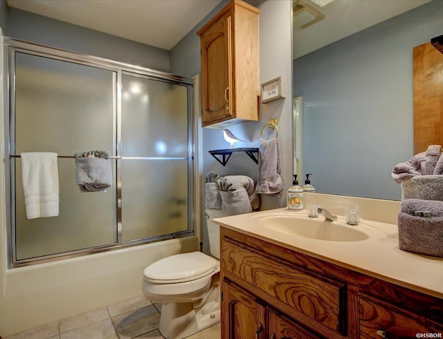 8 Redbird Ln Unit D, Mount Ida, AR 71957 - full bath with vanity, toilet, bath / shower combo with glass door, and tile patterned flooring