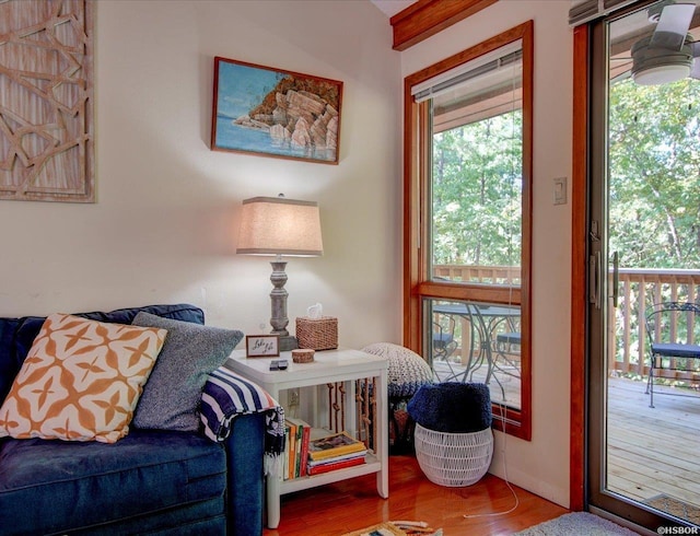 8 Redbird Ln Unit D, Mount Ida, AR 71957 - sitting room with wood finished floors