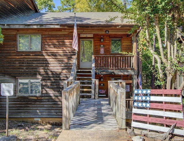 8 Redbird Ln Unit D, Mount Ida, AR 71957 - property entrance featuring covered porch