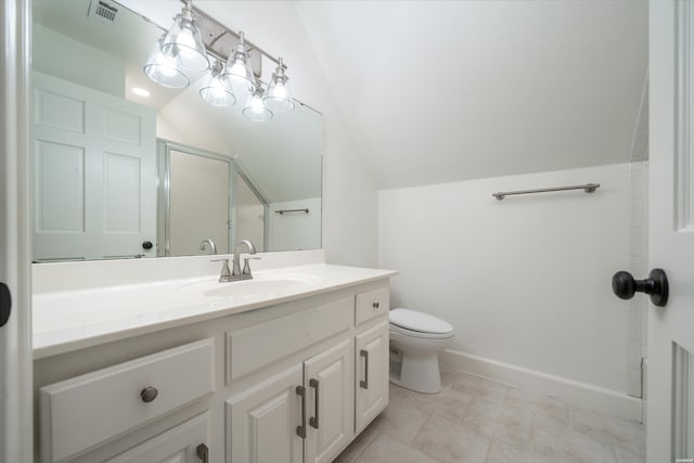 full bathroom featuring toilet, vanity, visible vents, vaulted ceiling, and a stall shower