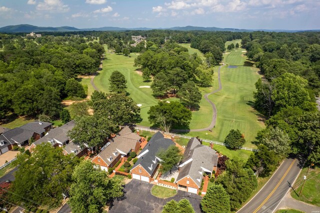 bird's eye view with view of golf course and a residential view
