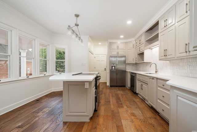 kitchen with a sink, stainless steel appliances, open shelves, dark wood-type flooring, and decorative backsplash