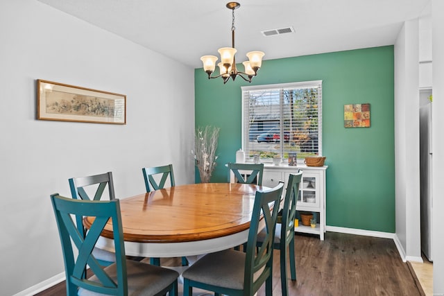 1135 Twin Points Rd Unit D, Hot Springs, AR 71913 - dining room with wood finished floors, visible vents, baseboards, and a notable chandelier