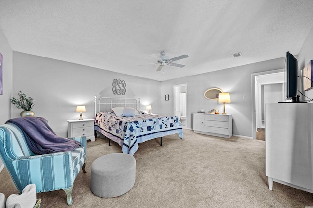 1135 Twin Points Rd Unit D, Hot Springs, AR 71913 - carpeted bedroom with a textured ceiling, ceiling fan, baseboards, ensuite bath, and visible vents