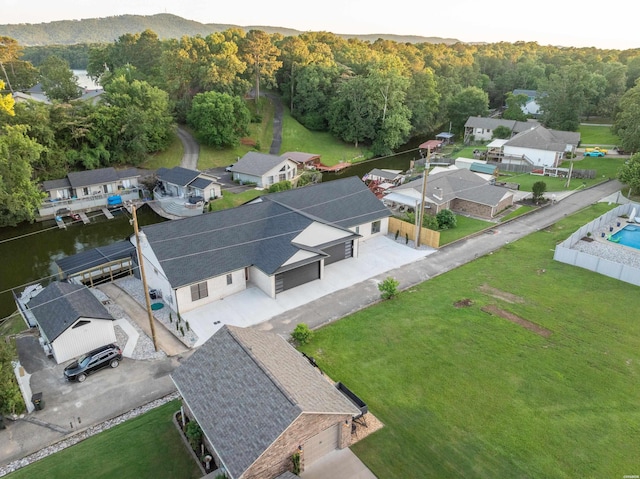 birds eye view of property with a residential view