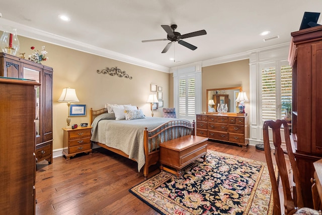 bedroom featuring visible vents, ornamental molding, recessed lighting, wood finished floors, and a ceiling fan