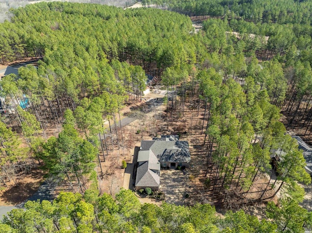 bird's eye view with a forest view