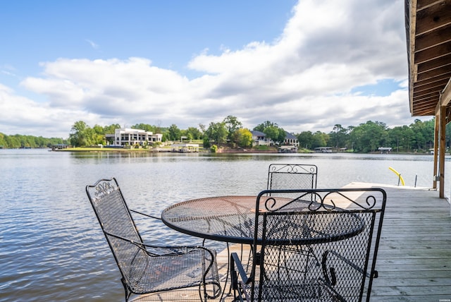 dock area with a water view