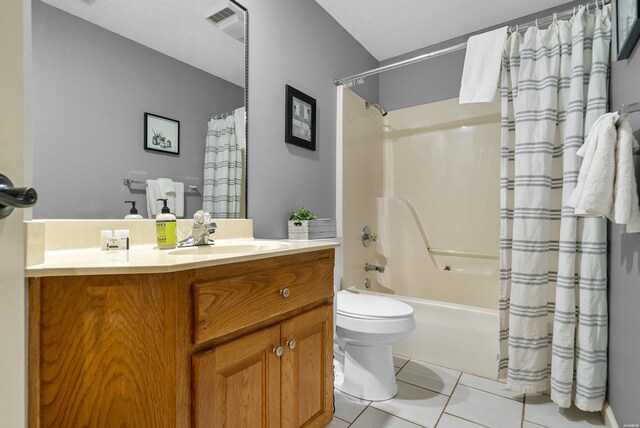 full bath with visible vents, toilet, tile patterned flooring, shower / bathtub combination with curtain, and vanity