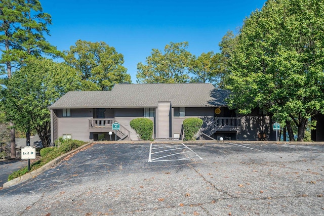 200 Hamilton Oaks Dr Unit G-2, Hot Springs, AR 71913 - view of property featuring stairs and uncovered parking
