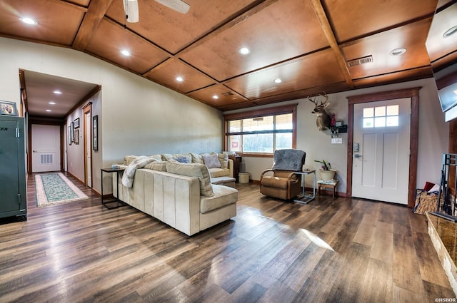 living area with plenty of natural light, dark wood-type flooring, coffered ceiling, and visible vents