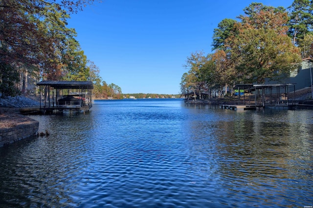 view of water feature featuring a boat dock and boat lift