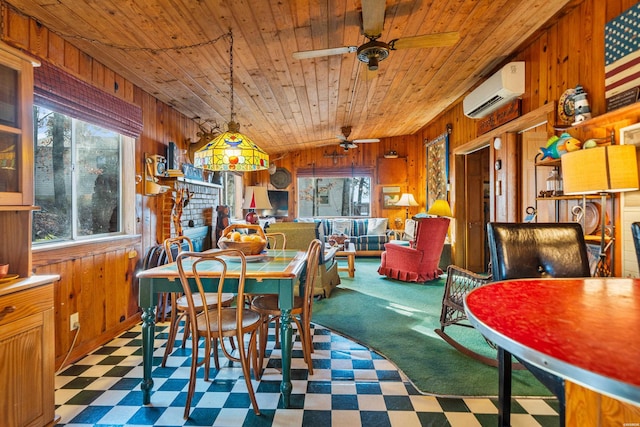 dining area with tile patterned floors, wooden ceiling, wood walls, and a wall mounted AC