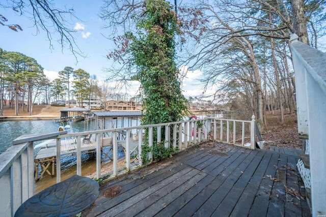 deck featuring a water view