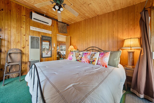 bedroom with an AC wall unit, wood walls, carpet flooring, and wood ceiling