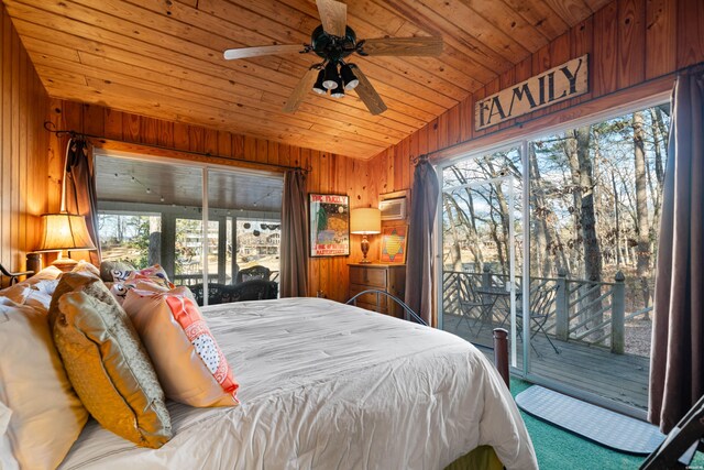 bedroom featuring access to exterior, lofted ceiling, wooden ceiling, and wooden walls