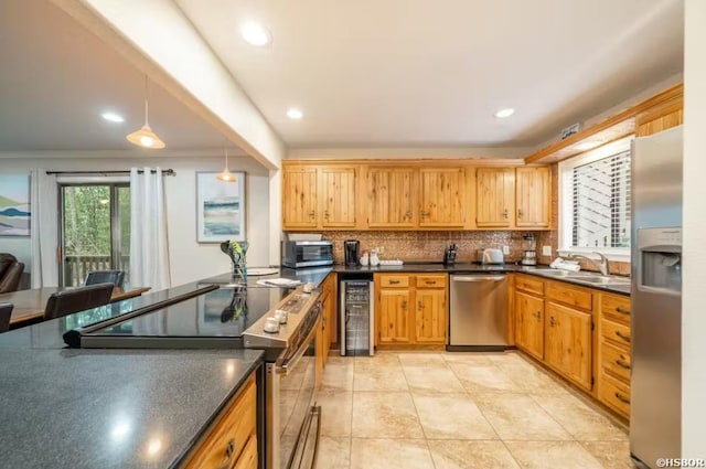 200 Hamilton Oaks Dr Unit J-2, Hot Springs, AR 71913 - kitchen featuring appliances with stainless steel finishes, dark countertops, a sink, wine cooler, and tasteful backsplash