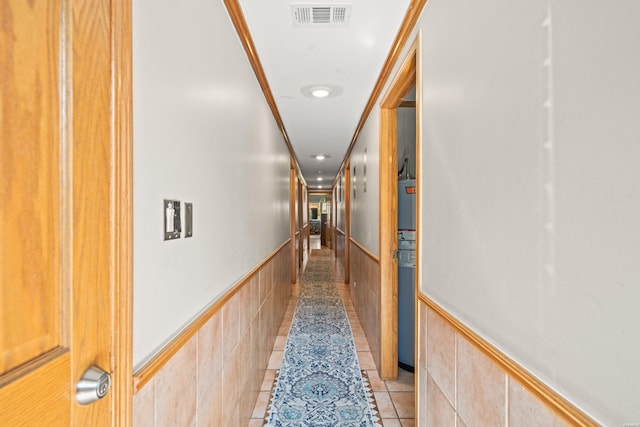120 Butler Ln, Hot Springs, AR 71913 - hallway with wainscoting, light tile patterned flooring, and visible vents