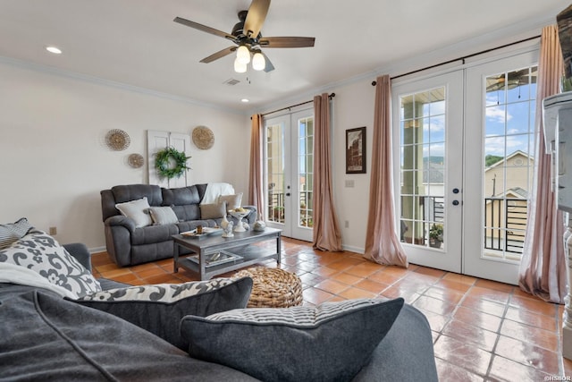 living room featuring ornamental molding, french doors, visible vents, and a ceiling fan